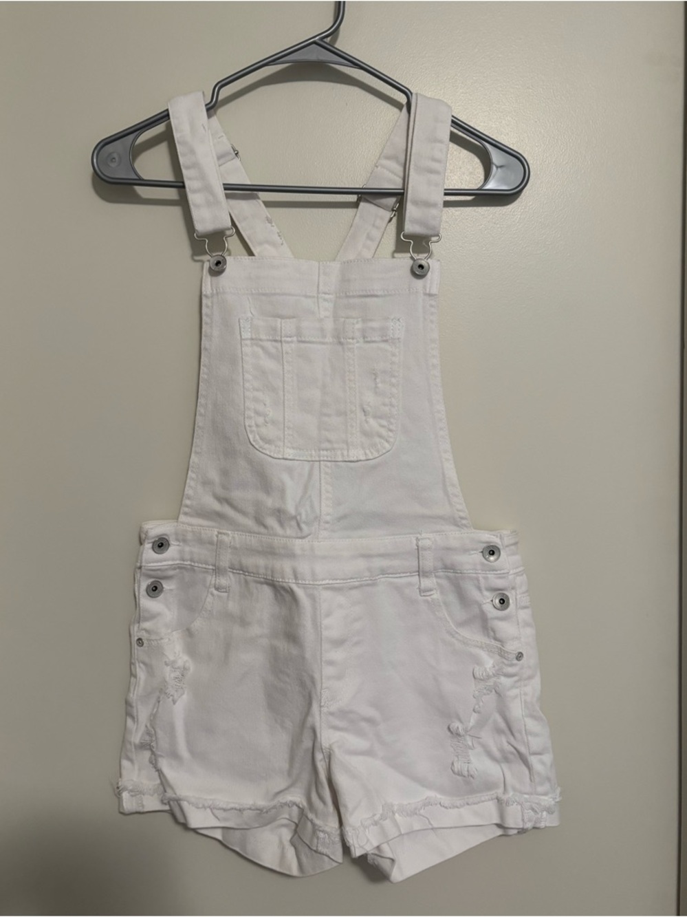 Wallflower Women’s distressed white overall shorts